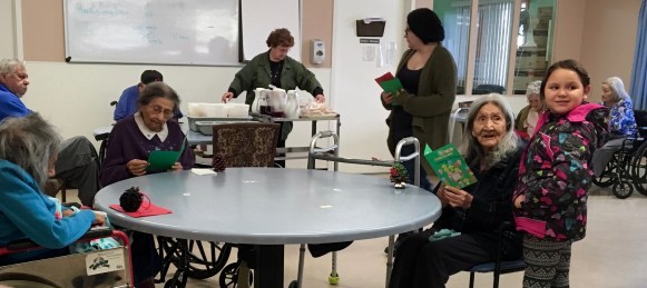 Giving homemade gifts and cards to the elders ...